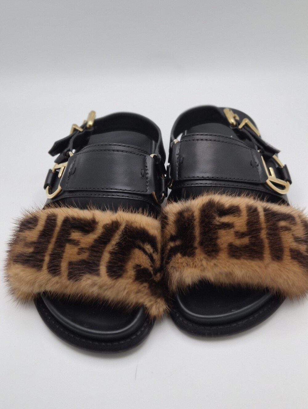 Fendi Black Leather Slides with Brown FF Fur Strap and Gold Buckles